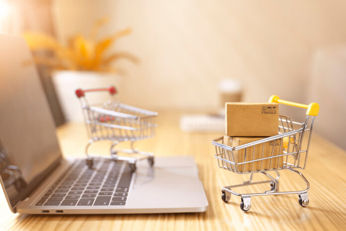 Online shopping and delivery service concept.Brown paper boxs in